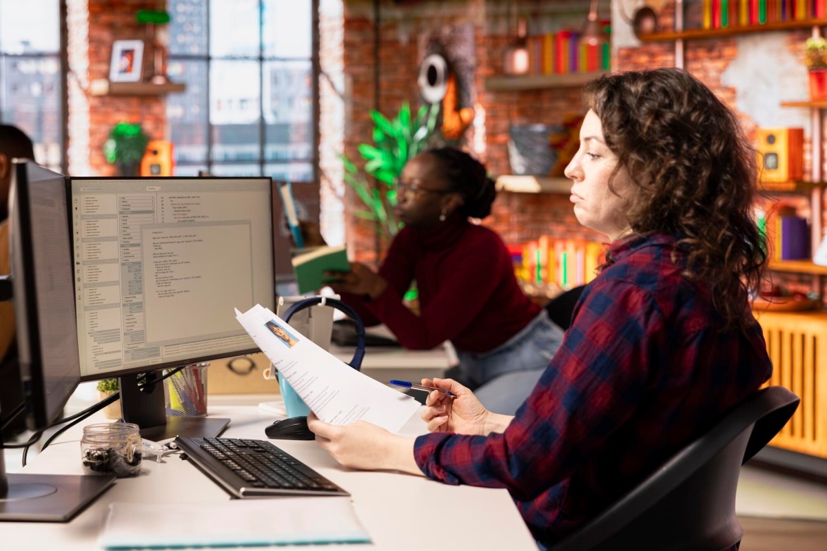 Person researching and organizing data lists