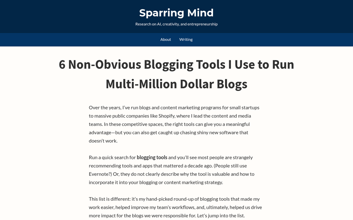 Person typing blog post on laptop