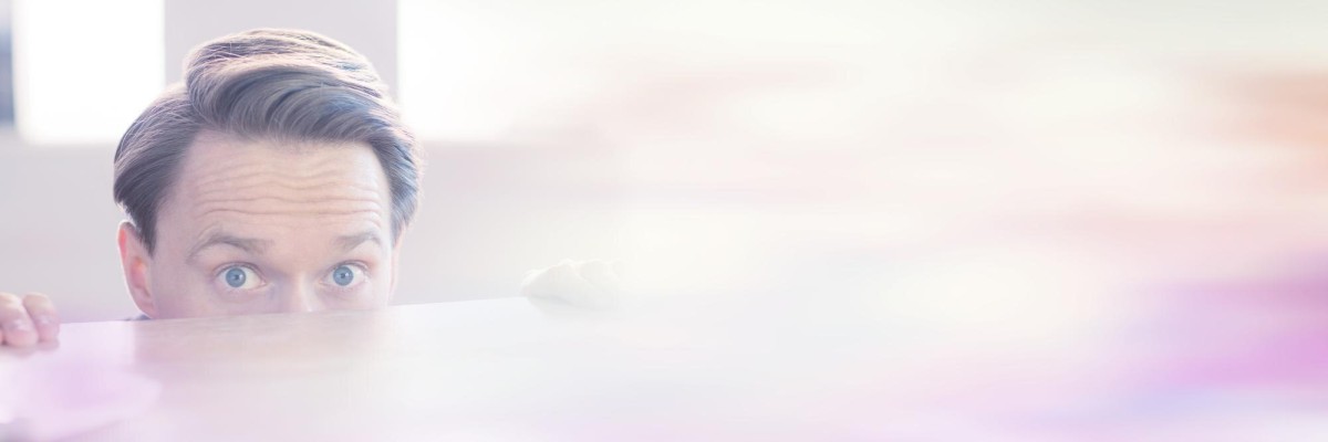 Person ignoring ads on computer screen