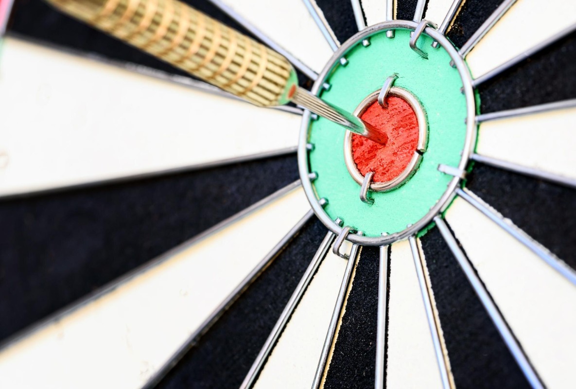 Person writing key takeaway notes