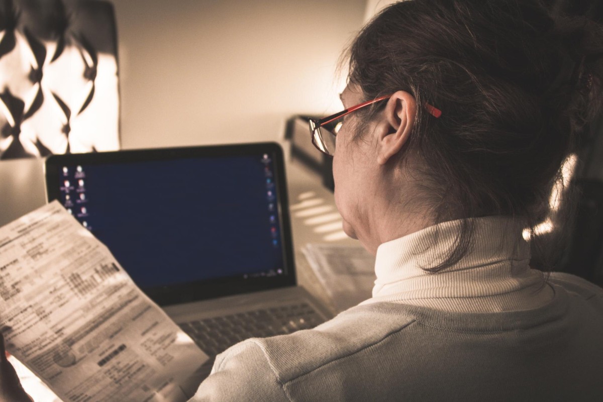 Person carefully selecting and organizing content