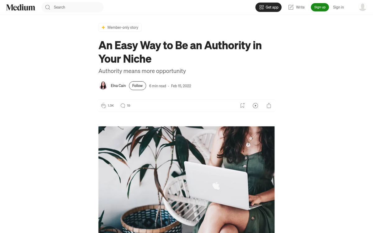 Employee writing confidently at a desk