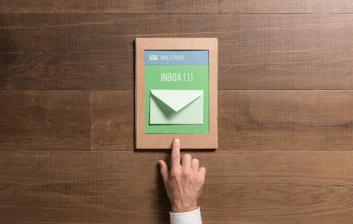 Person reading email newsletter on screen