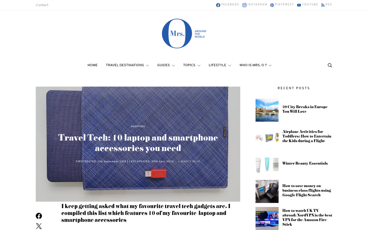 Laptop open on travel desk abroad