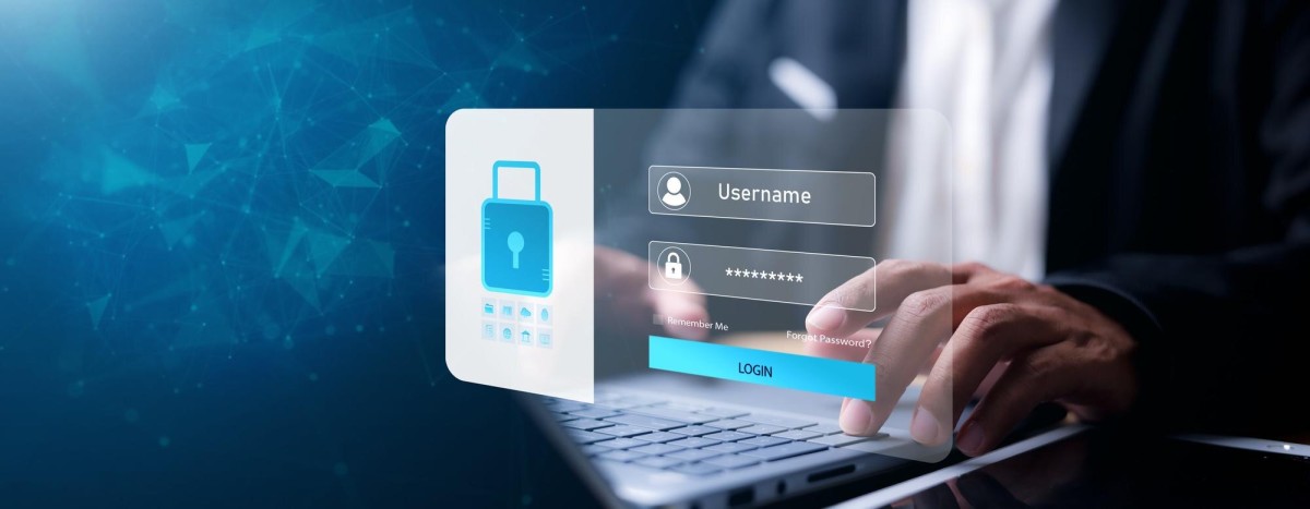 Person entering password on login screen