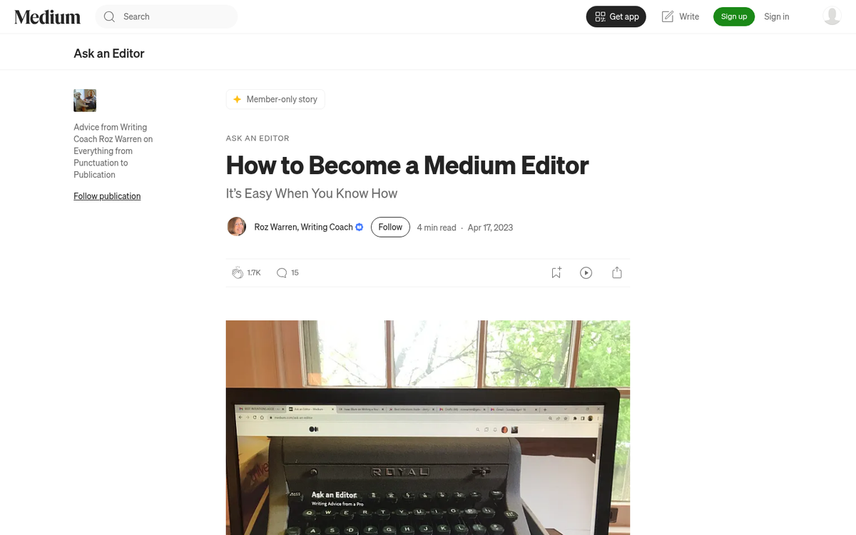 Writer typing engaging article on laptop