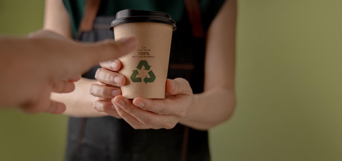 Starbucks coffee cups on café table