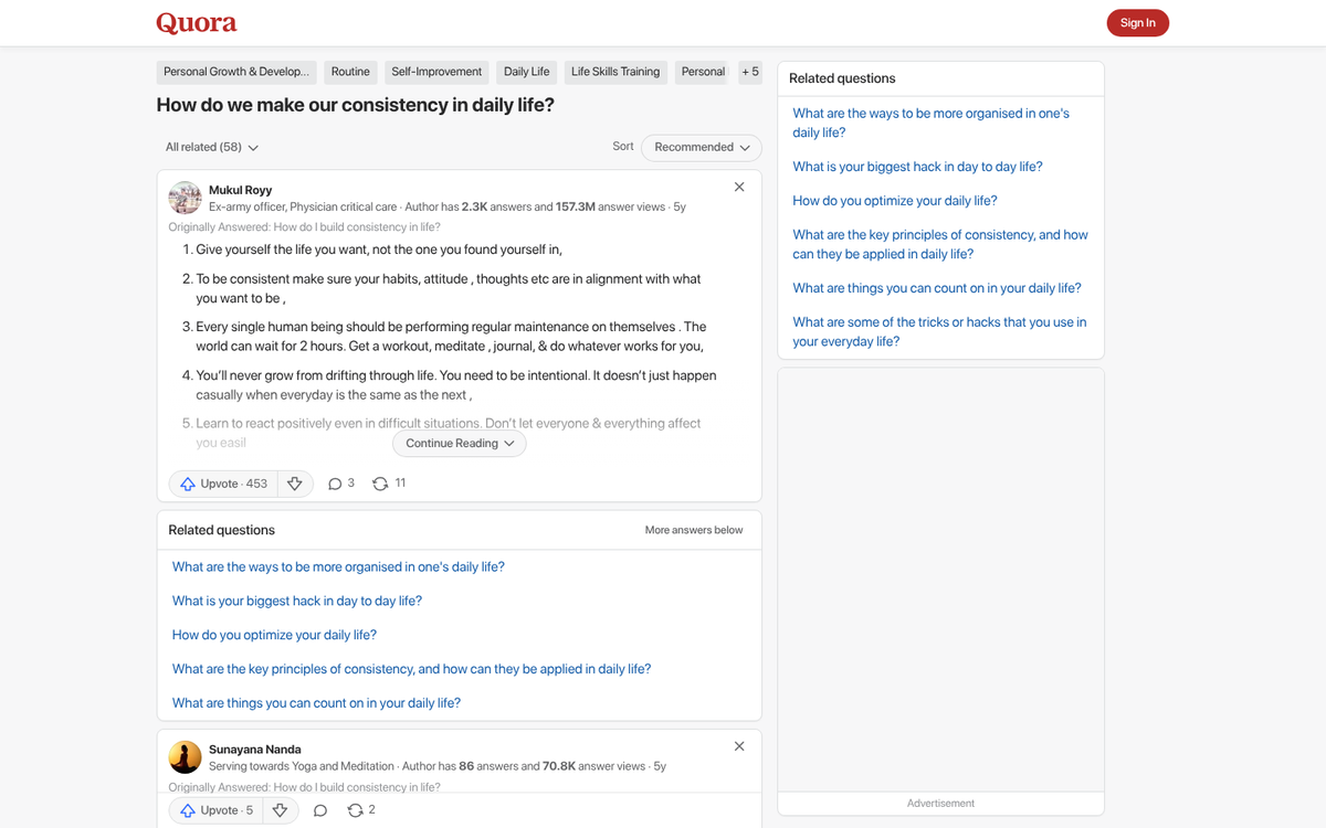 Person typing answers on Quora daily