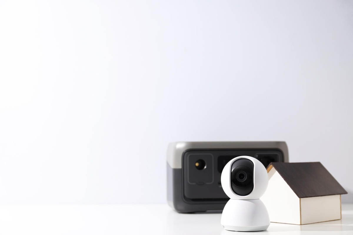 Home security camera mounted on wall