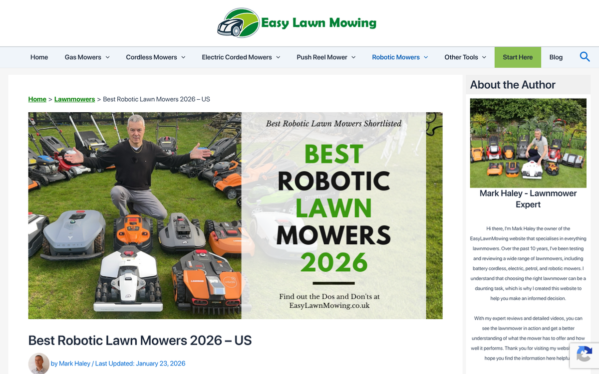 Lawn mower on green grass lawn