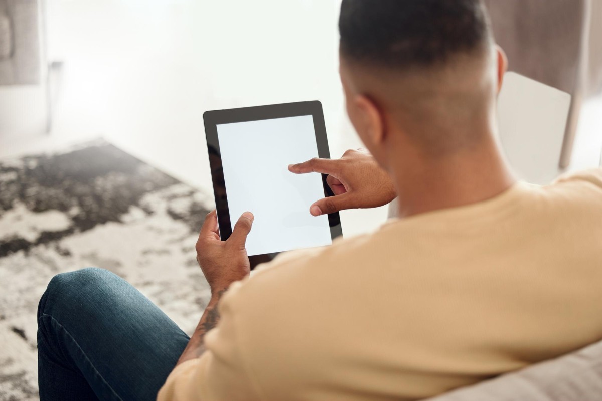 Person scrolling through social media feed quietly