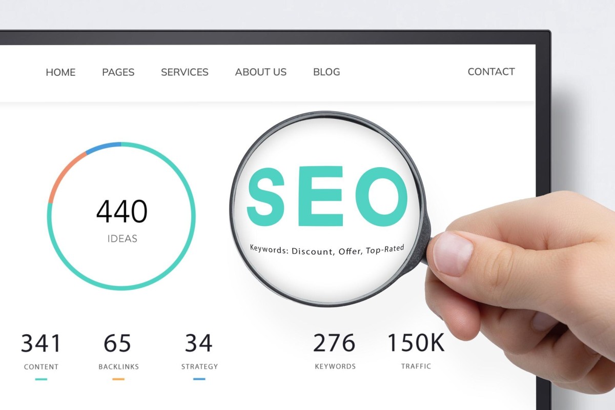 Person researching keywords on a laptop