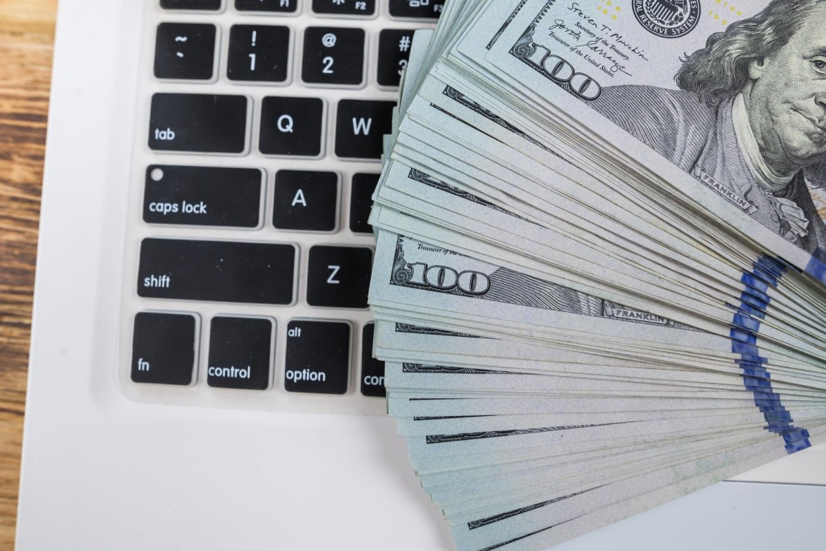 Stack of coins with rising bar graph