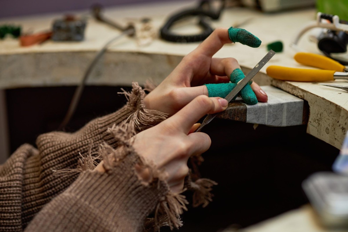 Person searching DIY tutorial on laptop