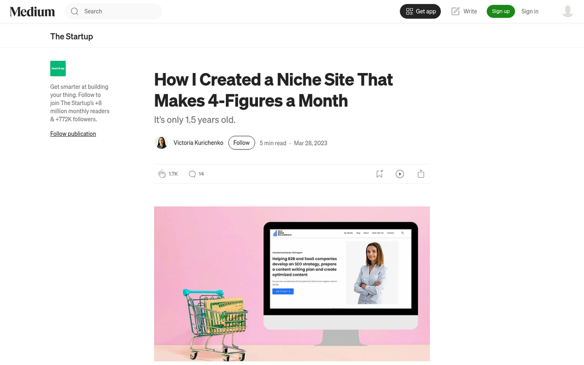 Person writing content on a laptop