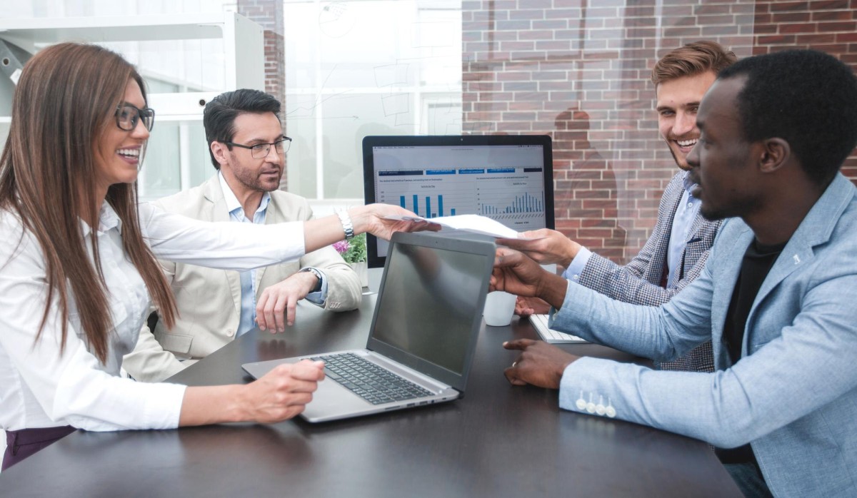 Person sharing analytics dashboard with colleagues