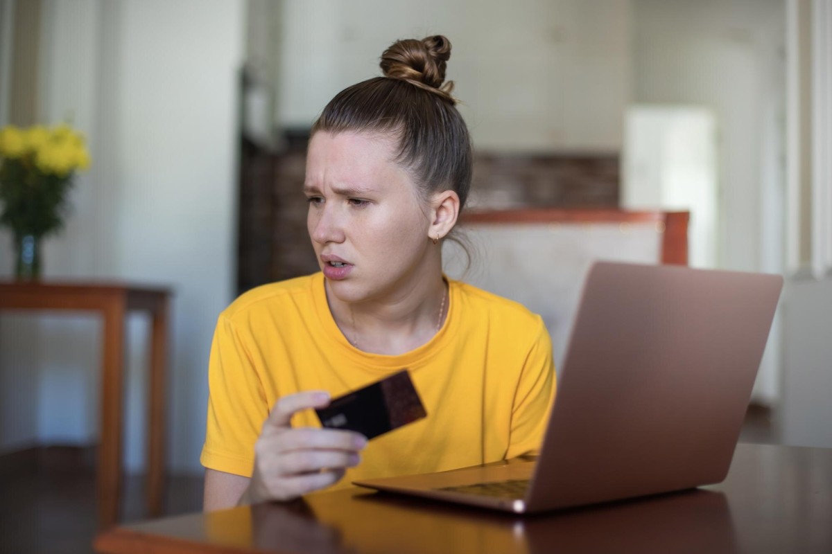 Empty shopping cart on white background