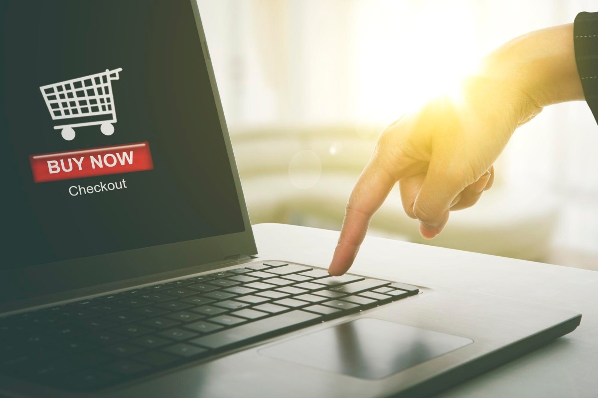 Person directing traffic toward Amazon store