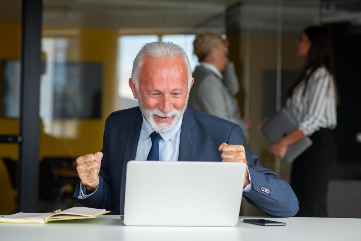 Wealthy person counting large stacks of cash