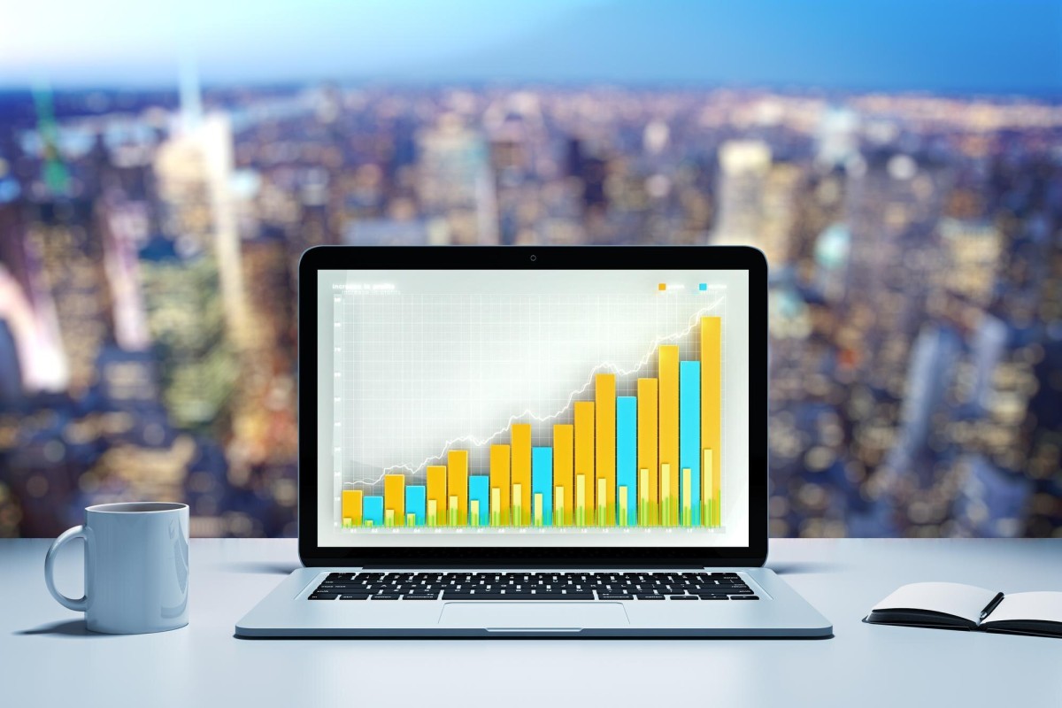 Person analyzing website traffic and ad revenue