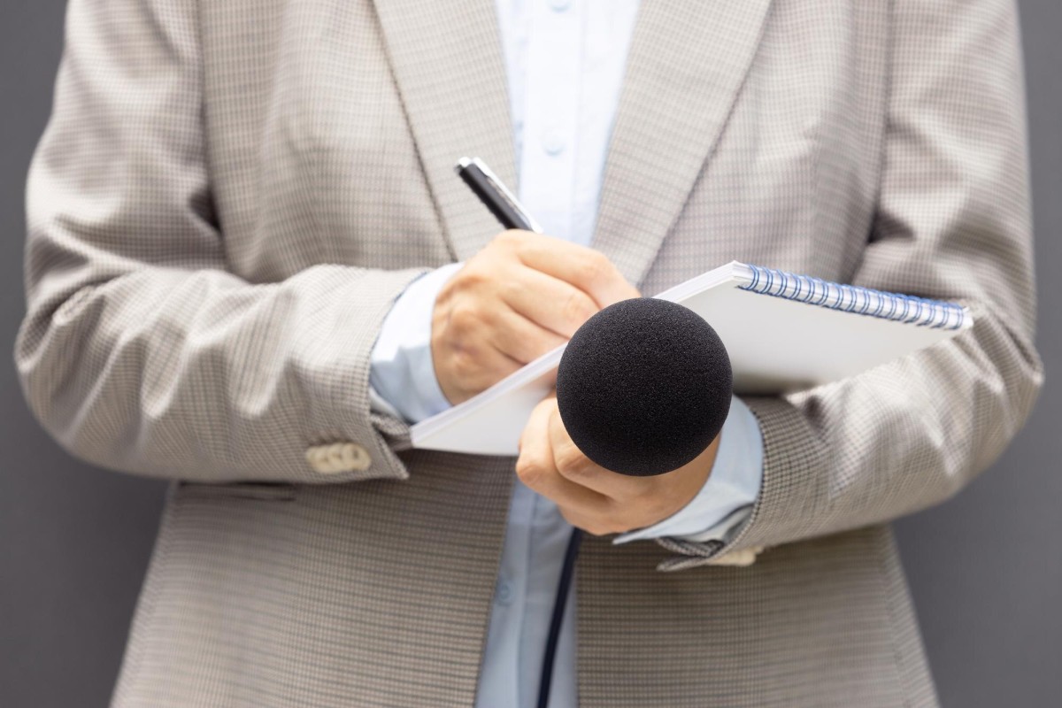 Person writing a press release document