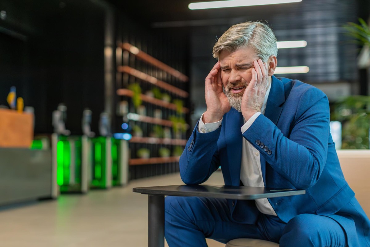 Person solving problem with light bulb idea