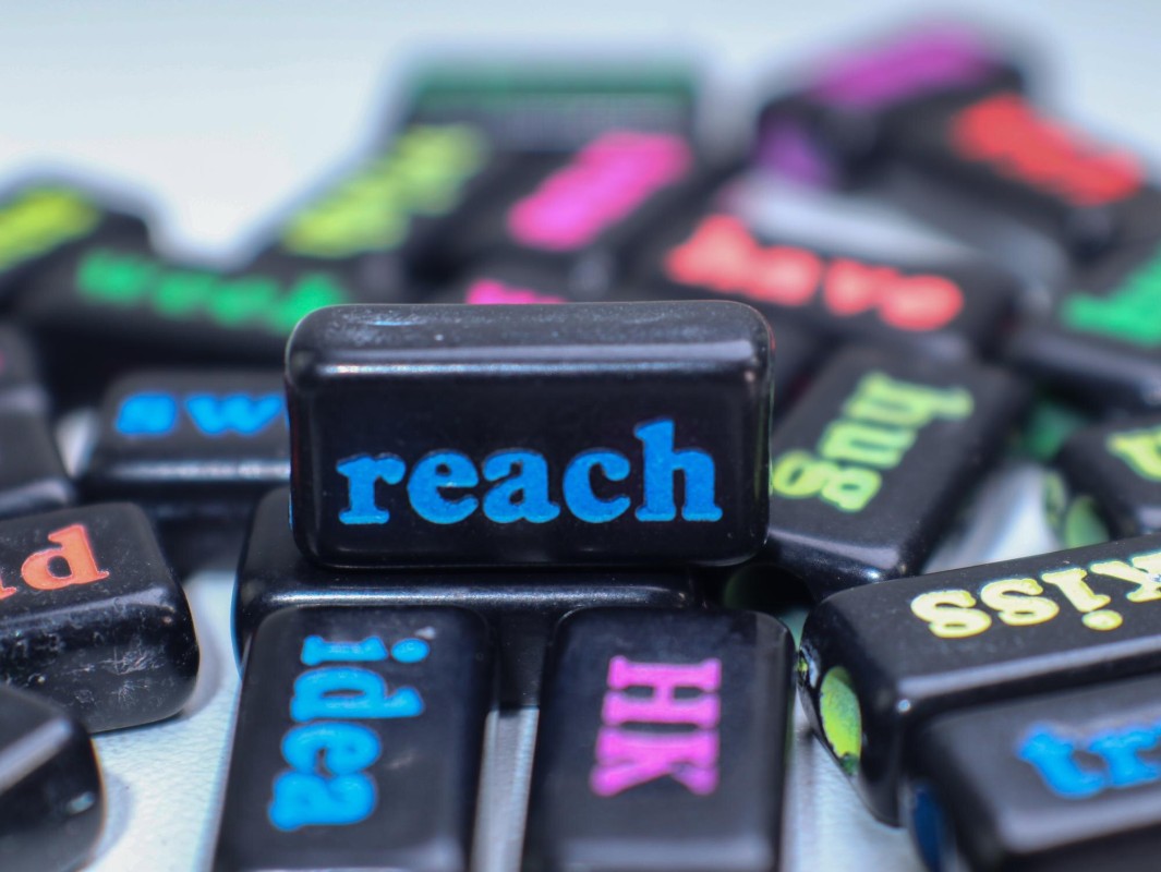 Magnifying glass examining keyword research data