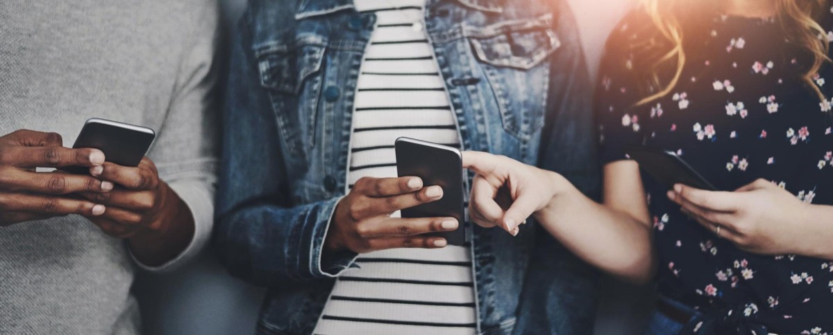 Person planting seeds in fertile soil