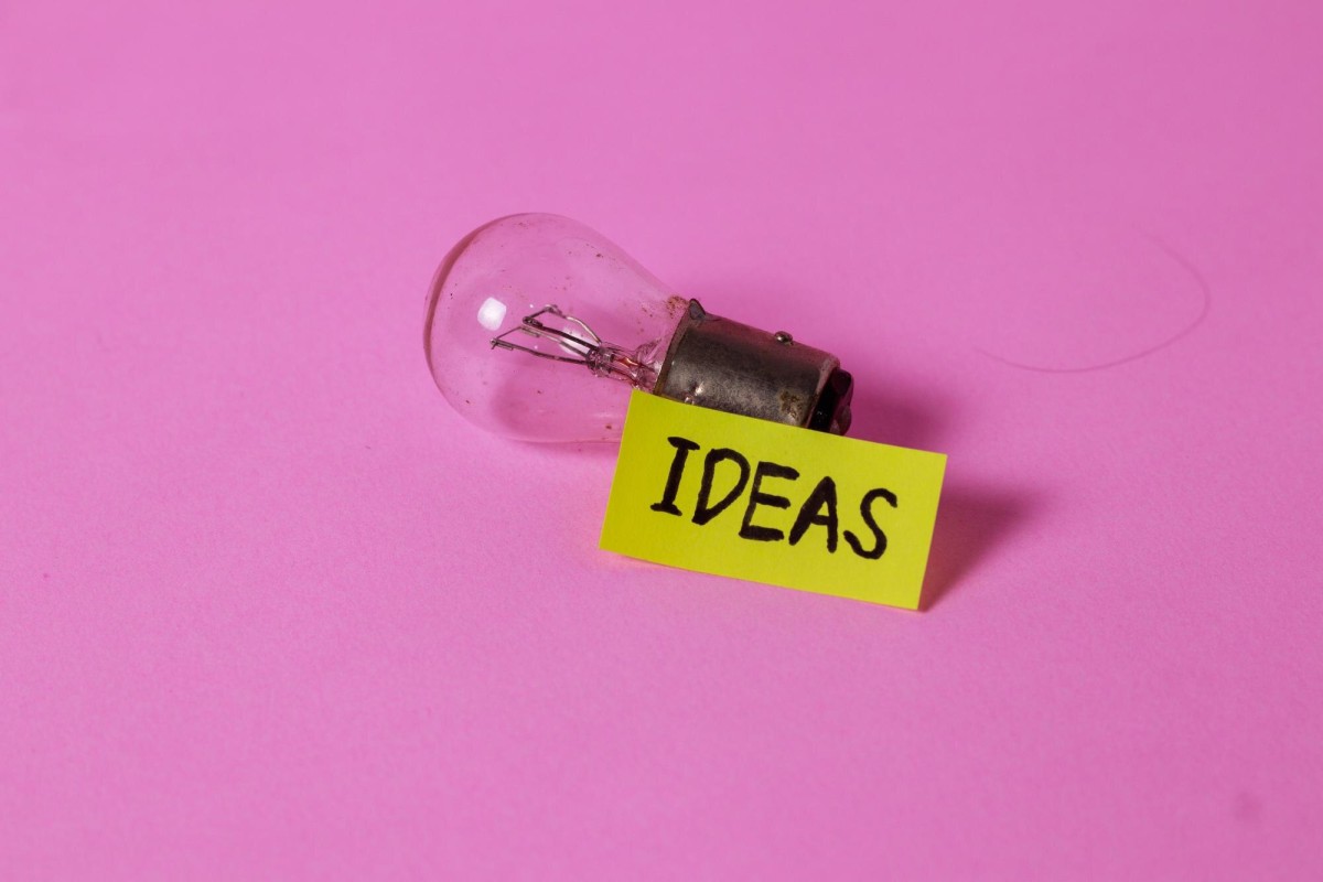 Person thinking with creative idea lightbulb