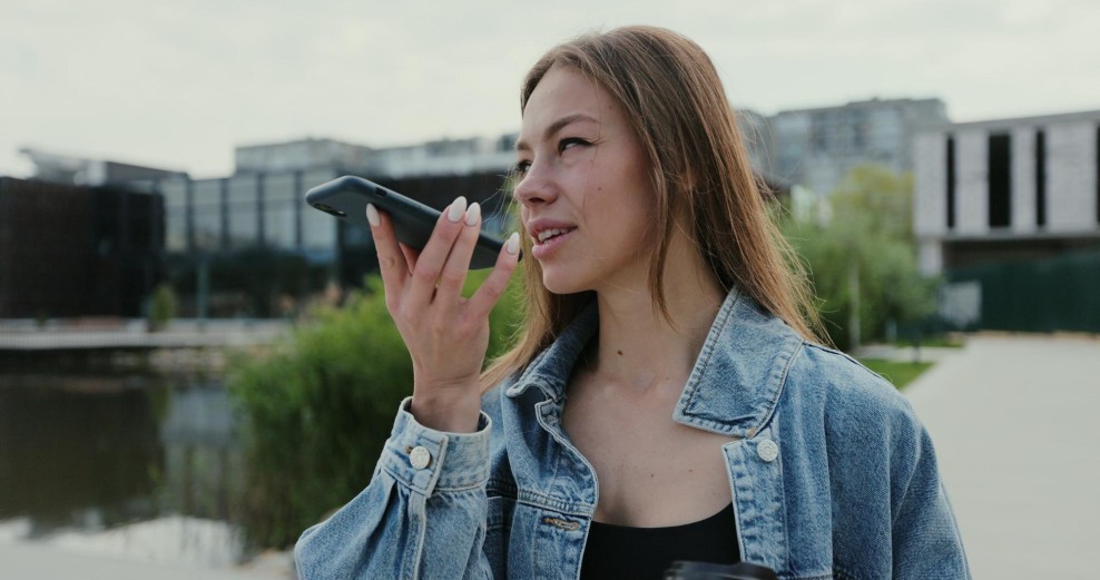 Person speaking voice search query aloud