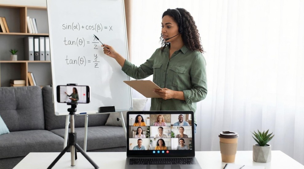 Blogger teaching audience through laptop screen