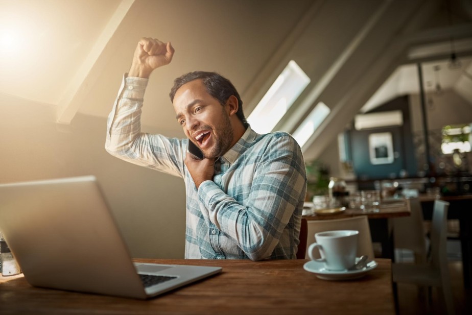 Person celebrating new blog going live online